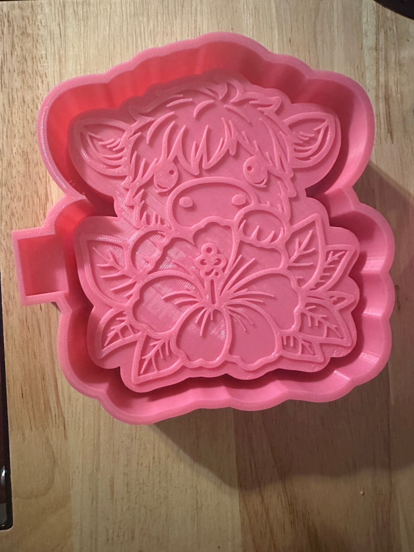 Highland Cow with hibiscus mold