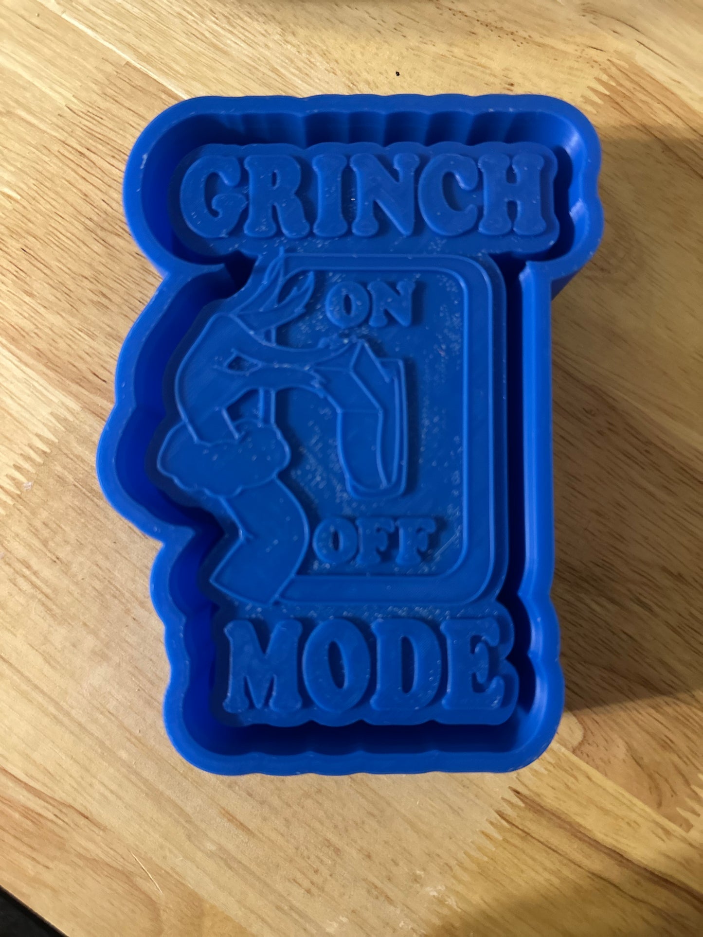 Green man light switch mold